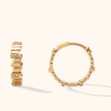 14K gold geometric baguette-style hoop earrings with pavé cubic zirconia detailing – modern huggie design for stacking or solo wear