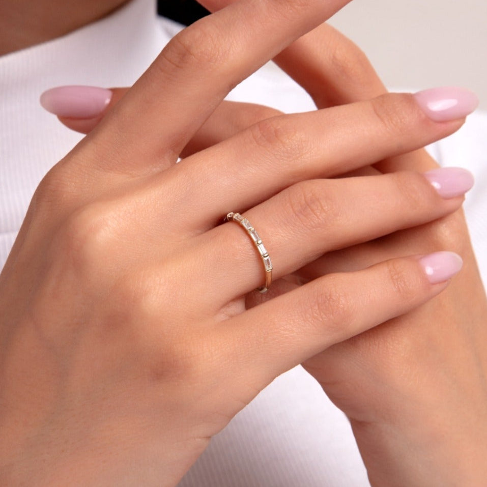 "Elegant 14K gold stacking ring with alternating baguette and round diamonds, minimalist style for everyday elegance.