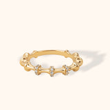 14K gold bamboo-inspired ring featuring pavé-set stones on three curved segments, perfect for stacking or wearing solo