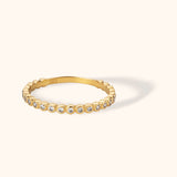 14K yellow gold eternity ring with round bezel-set diamonds in a full circle design
