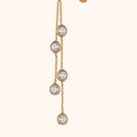 14K gold chain earring with five bezel-set faceted crystals in a drop design