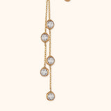 14K gold chain earring with five bezel-set faceted crystals in a drop design