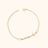 14K Gold Double-Strand Bracelet with Cross Charm and Three Faceted Beads