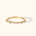 Elegant 14K gold ring with marquise-inspired diamond details and pointed prongs, perfect for stacking