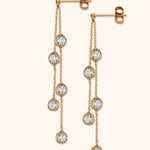 14k gold dangle earrings with multiple faceted clear crystals and delicate chain

