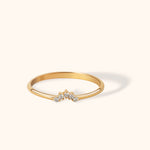 Minimal 14K yellow gold V-shaped ring with five small round diamonds, perfect for stacking or as a contour wedding band