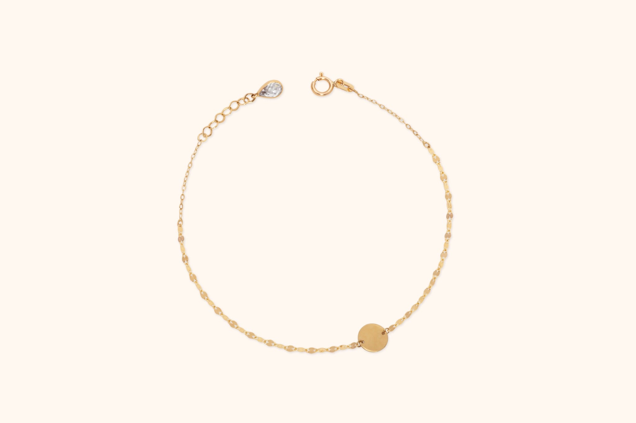 Minimalist 14K gold bracelet with round disc charm on delicate chain