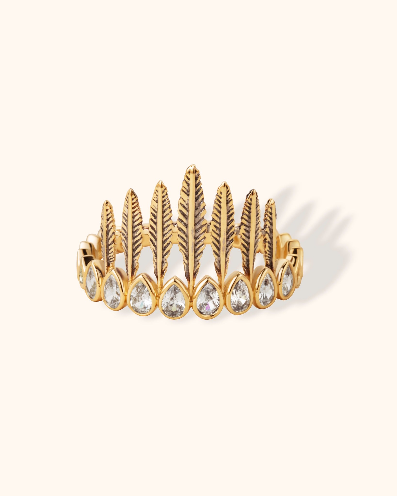 14K gold feather crown ring with teardrop zirconia stones, bohemian vintage-style jewelry.
