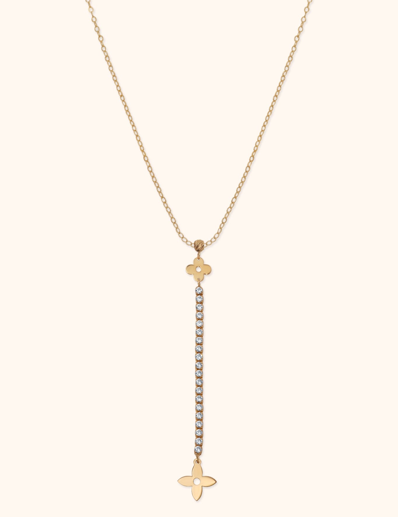 14K gold necklace with floral charm and vertical row of crystals forming a drop pendant