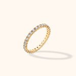 14K gold full eternity ring with brilliant-cut diamonds encircling entire band