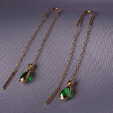 14K gold threader earrings with green teardrop gemstone drops on fine chain