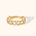 14K gold ring featuring an openwork honeycomb hexagon pattern in a sleek geometric design