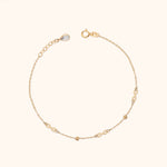 14K Gold Infinity Bracelet with Dainty Symbols and Beaded Accents – Elegant Minimalist Jewelry