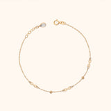 14K Gold Infinity Bracelet with Dainty Symbols and Beaded Accents – Elegant Minimalist Jewelry
