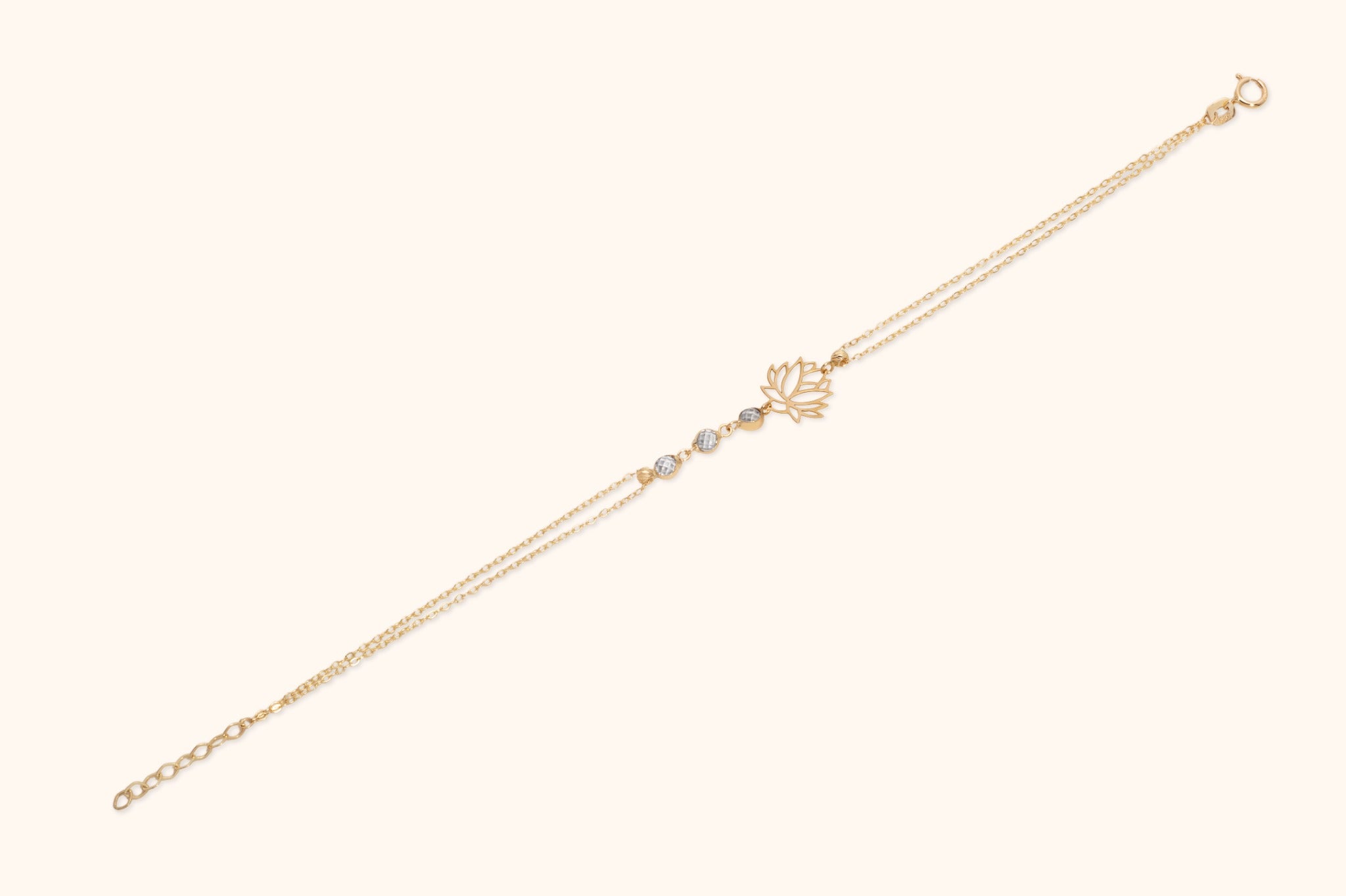 14K gold bracelet with lotus flower charm and textured silver beads