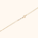 14K gold bracelet with lotus flower charm and textured silver beads