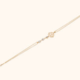 14K gold bracelet with lotus flower charm and textured silver beads