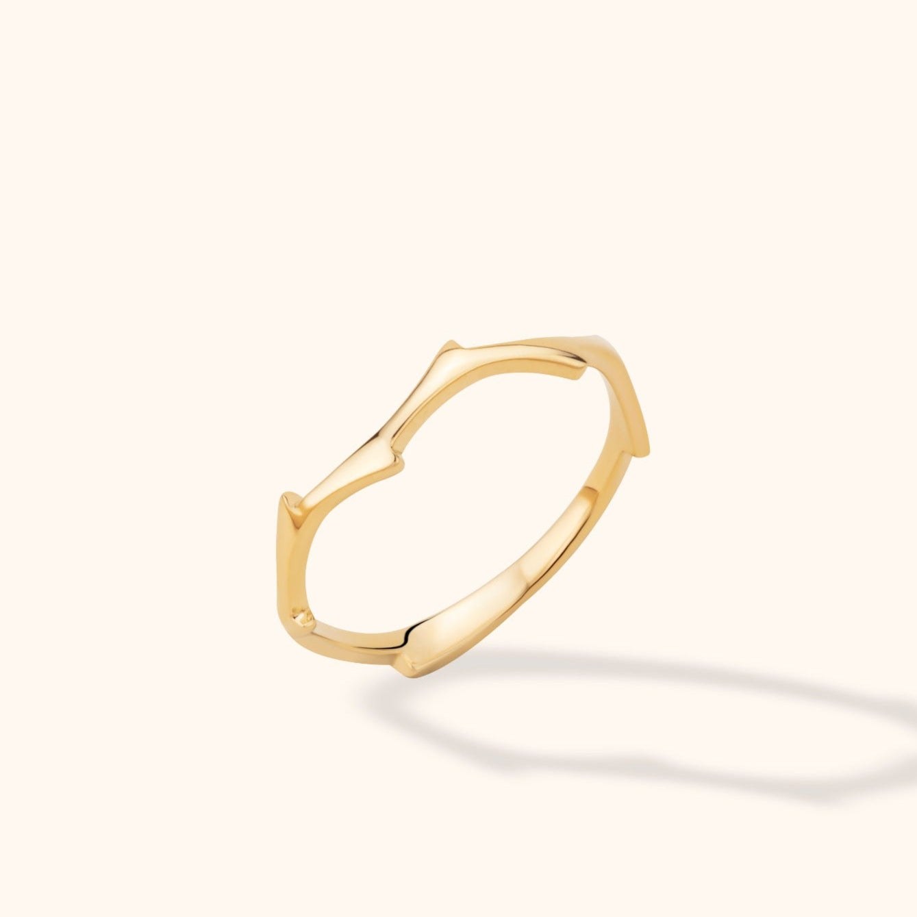 14K Gold Organic Wave Ring on finger,Minimalist 14K gold ring with wave design, Stackable 14K gold textured band