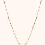 14K gold paperclip link necklace with alternating classic and elongated chain segments