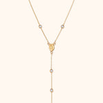 14K gold rosary necklace with Virgin Mary medallion, white stones, and cross charm