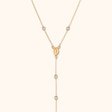 14K gold rosary necklace with Virgin Mary medallion, white stones, and cross charm
