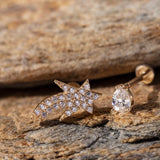 14K Gold Shooting Star Tragus Stud and Teardrop CZ Piercing Set – Dainty cartilage earrings featuring a sparkling star-shaped stud with pavé-set cubic zirconia stones and a minimalist pear-cut CZ stud, ideal for tragus or cartilage piercing stacks