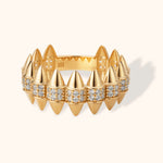 14K gold spiked ring with pavé cubic zirconia, modern edgy jewelry design on cream background.
