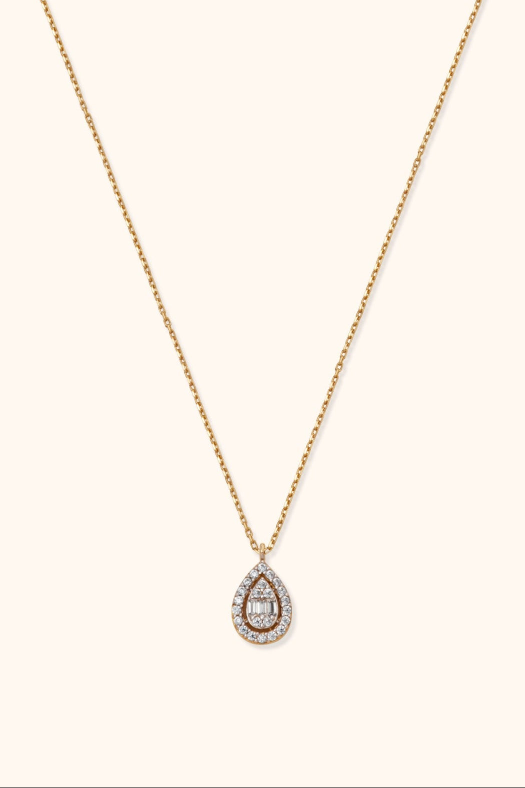 14K gold teardrop pendant necklace with halo diamonds and baguette center