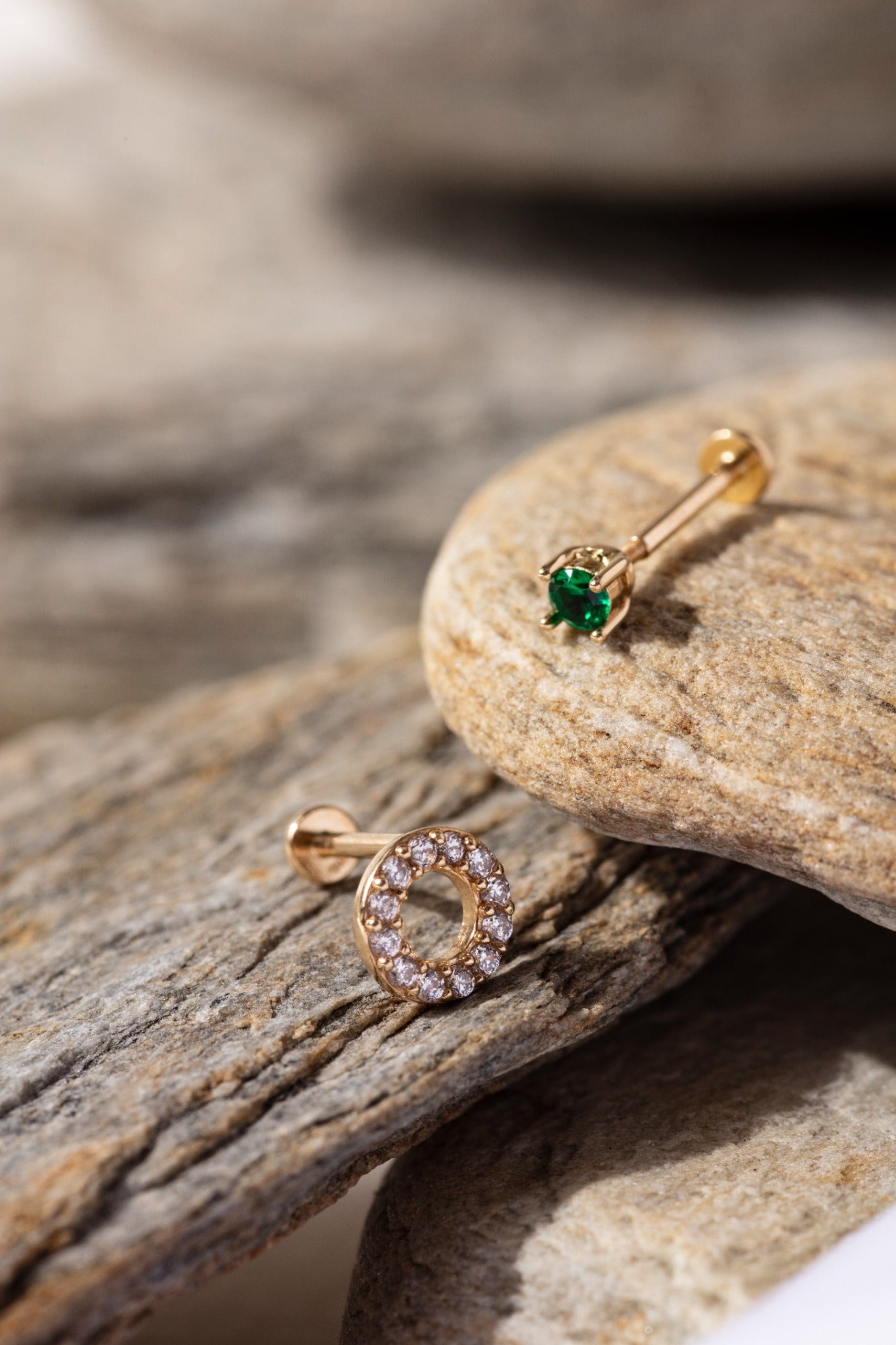 14K Gold Tragus Piercing Set featuring a pavé CZ circle stud and a minimalist green emerald-tone round stud – Elegant cartilage earrings perfect for stacking or solo wear, designed for tragus or helix placements