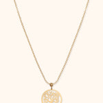 14K gold Tree of Life necklace with symbolic medallion pendant on delicate chain