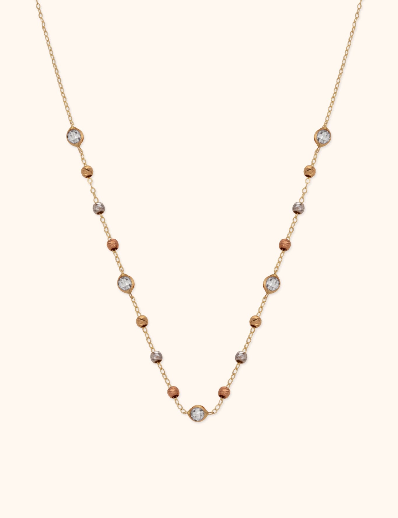 14K gold necklace with tricolor beads and zircon stones in an elegant station design