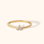 14K yellow gold ring with a minimalist three-diamond cluster set in a triangle formation