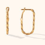 14K gold twisted oval hoop earrings – minimalist sculptural gold hoops