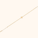 14K solid gold bracelet with clover charm on a delicate beaded chain