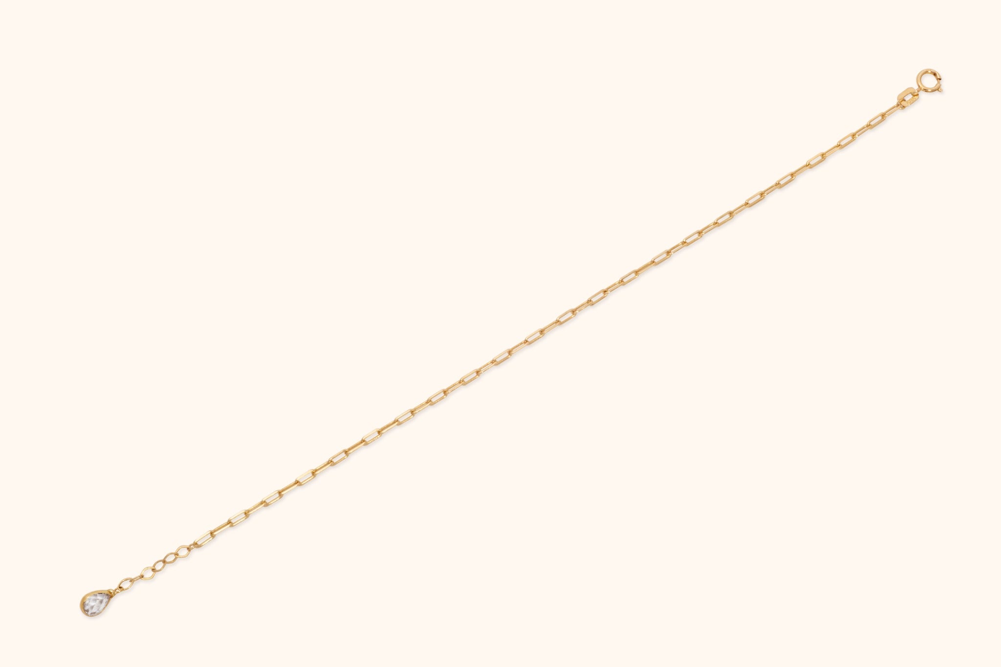 Minimalist 14K gold paperclip chain bracelet with elongated links, perfect for everyday wear or stacking.