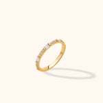 14K yellow gold half-eternity band with alternating baguette and round zircon accents, modern stackable ring style