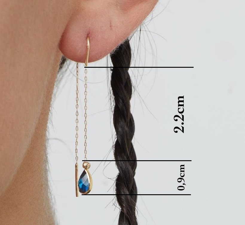 14K gold threader earrings with pear-shaped blue sapphire gemstones on fine gold chain