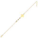 14K gold bracelet with maple leaf charm and gemstone accents on green satin