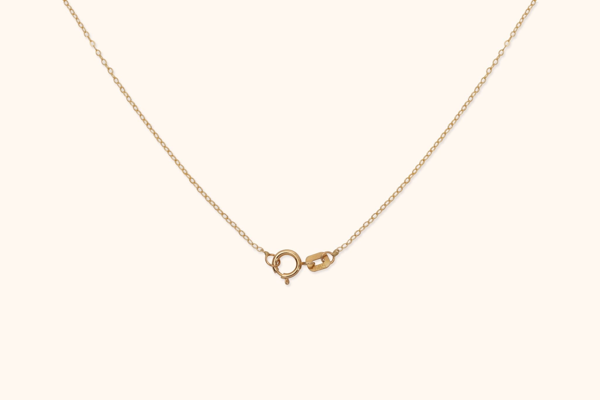 14K gold spring ring clasp detail on fine jewelry chain