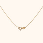 14K gold spring ring clasp detail on fine jewelry chain