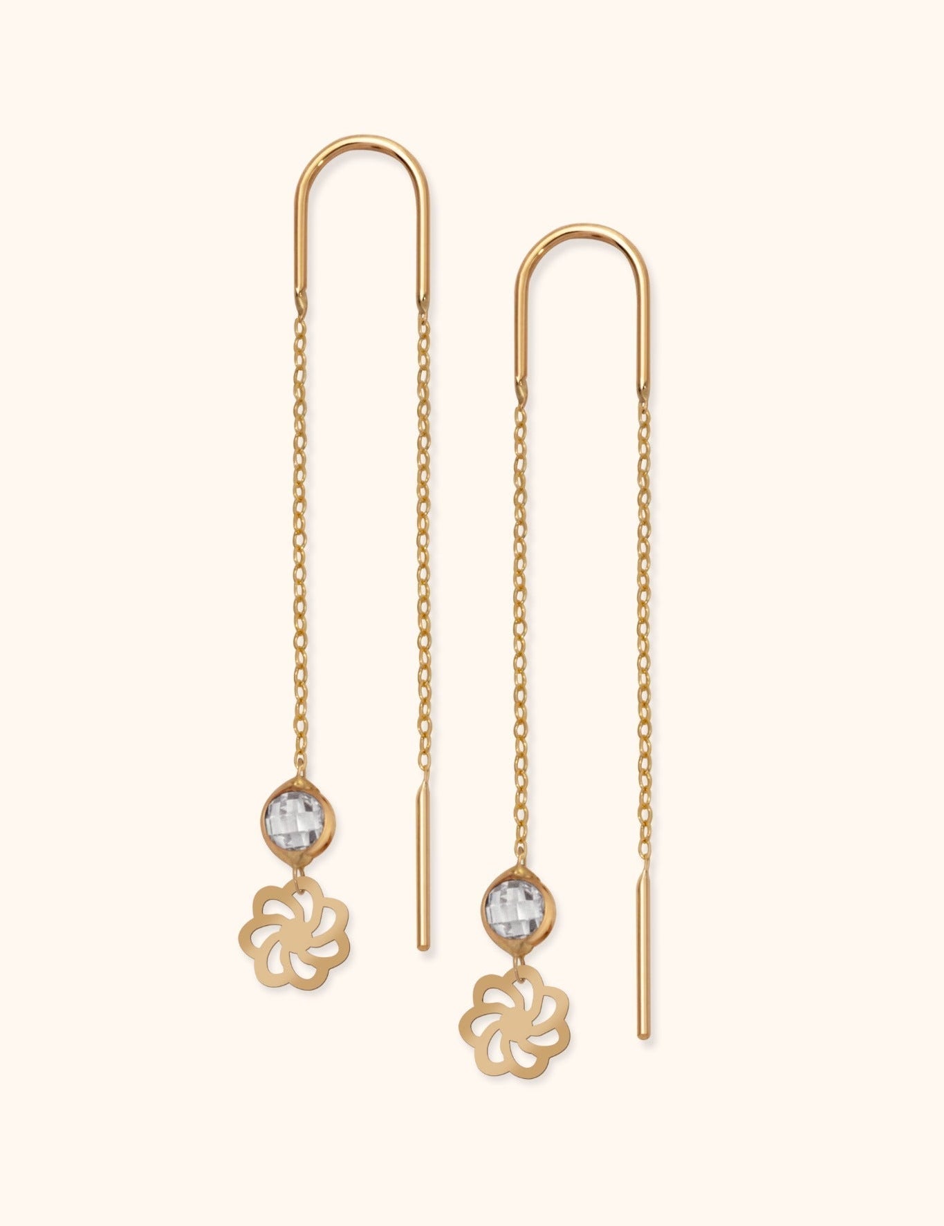Pair of gold-tone threader earrings with fine chains, clear faceted accents, openwork flower charms and slim bar ends.