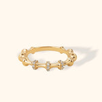 14K gold bamboo-inspired ring featuring pavé-set stones on three curved segments, perfect for stacking or wearing solo