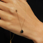 Elegant 14K gold necklace with black onyx teardrop pendant