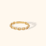 14K solid gold ring with chain link design on light beige background