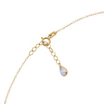 14K gold necklace with a key-shaped pendant featuring a four-leaf clover design,
