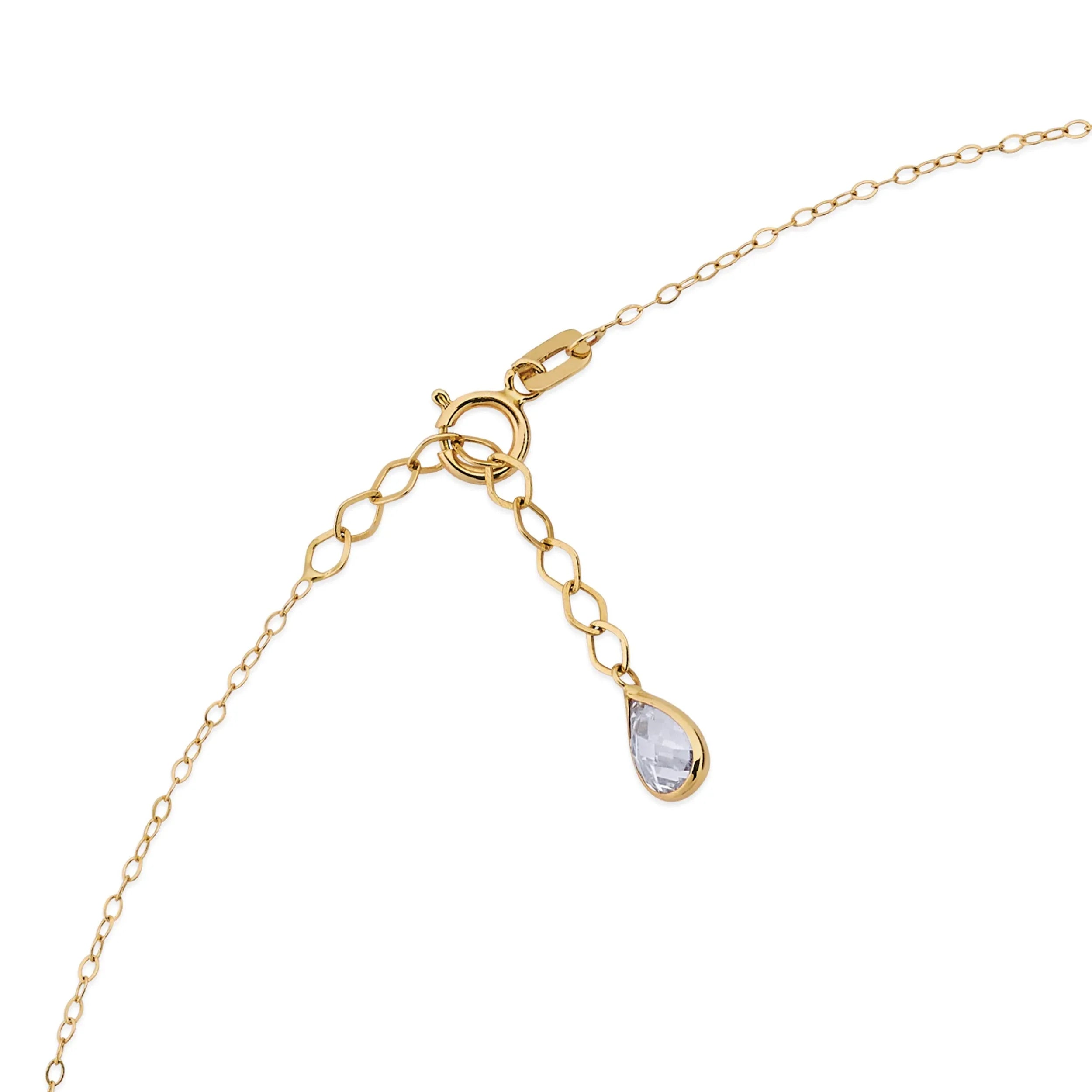 14K gold necklace with a key-shaped pendant featuring a four-leaf clover design,