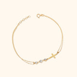 14K Gold Double-Strand Bracelet with Cross Charm and Three Faceted Beads