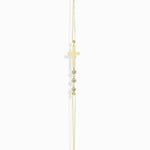 14K gold bracelet with minimalist cross and three small crystal beads, displayed white
