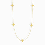 Minimalist 14K gold bracelet with flying bird charms