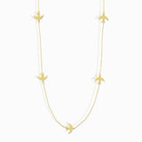 Minimalist 14K gold bracelet with flying bird charms